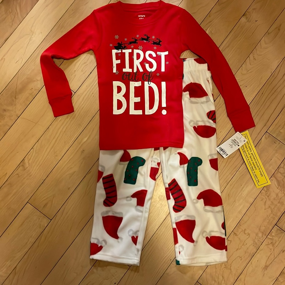 Size 4 Christmas jammies by carters. New with tags